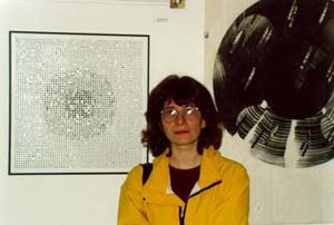 Irina
Danilova (artist)
in front of her work